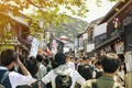 Large crowd scene at Matsubara Dori, popular shopping street on the way to famous Kiyomizu-dera temple in Kyoto, Japan