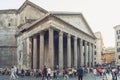 A large crowd of tourist visiting the Pantheon, ancient Roman temple and Catholic church at Piazza della Rotonda in Rome, Italy