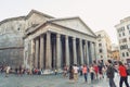 A large crowd of tourist visiting the Pantheon, ancient Roman temple and Catholic church at Piazza della Rotonda in Rome, Italy