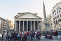 A large crowd of tourist visiting the Pantheon, ancient Roman temple and Catholic church at Piazza della Rotonda in Rome, Italy