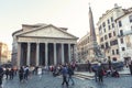 A large crowd of tourist visiting the Pantheon, ancient Roman temple and Catholic church at Piazza della Rotonda in Rome, Italy