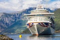 Large Cruise ship departure in the port of Flam to Stavanger, in sunny summer day, Norway.