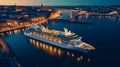 Large cruise ship in the port of the beautiful European city. Aerial view