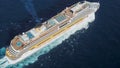 Large Cruise ship sailing across The Mediterranean sea - Aerial view. Stock. White passenger ship video from quadcopter