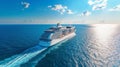 A large cruise ship sails across the endless blue ocean on a bright sunny day Royalty Free Stock Photo