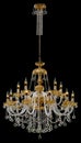 Large crystal chandelier with candles isolated on black background. Royalty Free Stock Photo