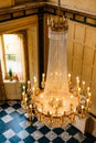 Large crystal chandelier with candles, top view.