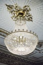 Large crystal chandelier hanging from the ceiling Royalty Free Stock Photo