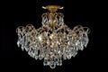 Large crystal chandelier isolated on black background. Royalty Free Stock Photo