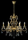 Large crystal chandelier isolated on black background.