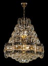 Large crystal chandelier isolated on black background. Royalty Free Stock Photo