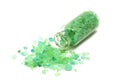 Large crystals green salt in a glass bottle