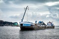 Large Cutter Suction Dredger vessel entering the harbor the fishing village of Urk in the Netherlands