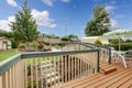 Large deck with nature patterned table setting.