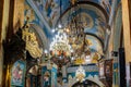 Large decorative chandeliers hang in the main hall of the Greek Orthodox Church of the Annunciation in the old city of Nazareth in