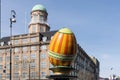 A large decorative Easter egg against a building in the city of Copenhagen Royalty Free Stock Photo