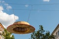 large decorative straw hat with a view of the sky