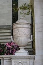 antique vase next to steps in front of an office building, Bryant park in Lexington avenue Manhattan