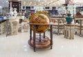 A large decorative wooden globe for sale in a roadside store near Maan city in Jordan