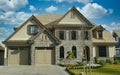 Designer Mansion Home House Maison Rock Stucco Front Exterior Cumulus Clouds Sky Background Royalty Free Stock Photo