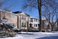 Large detached middle class single family houses on a sunny day in winter