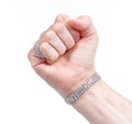 Large diamond ring and bracelet on the hand on a male adult Royalty Free Stock Photo