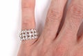 Large diamond ring on the hand on a male adult Royalty Free Stock Photo