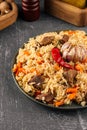 Large dish with Uzbek festive pilaf plov