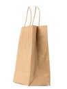 Large disposable brown kraft paper bag with handles isolated on white background, eco packaging, zero waste