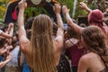 Diverse people dance at earth festival