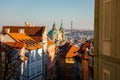 Large dome and rooftop of St Nicholas Baroque Church above Mala Strana quarter, Nerudova street view from Town hall stairs, Lesser