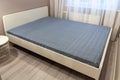 Large double bed in a hotel