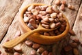 Large dried broad beans close-up in a wooden bowl. horizontal Royalty Free Stock Photo