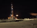 A large drilling rig at night. Drilling rig moon Oilfield night industries.