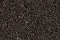 Large dry leaves of black tea. Black tea background. Black tea texture Royalty Free Stock Photo