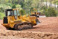 Large earth mover digger clearing land Royalty Free Stock Photo