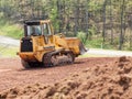 Large earth mover digger clearing land Royalty Free Stock Photo