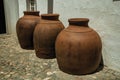 Large earthenware vessels over floor Royalty Free Stock Photo