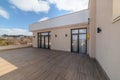 Large empty clean balcony with large windows