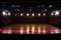 large, empty comedy club auditorium with spotlighted stage