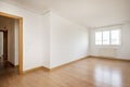 Large empty living room with light oak hardwood floors, bay window Royalty Free Stock Photo