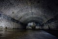 Large empty old dark underground vaulted cellar Royalty Free Stock Photo