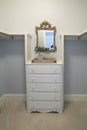 Large empty walk in closet with built in dresser and drawers Royalty Free Stock Photo