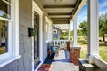 Large entance porch with brick trim and white railings Royalty Free Stock Photo