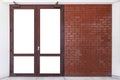 Large entrance door brown solid wood building and the red-brown brick wall Royalty Free Stock Photo