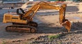 Large excavator in a just opened construction site