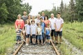 Large family with cousin grandparent father and kid on a forest Royalty Free Stock Photo