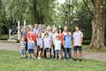 Large family with cousin grandparent father and kid on a forest Royalty Free Stock Photo