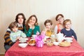 The large family at the dinner-table