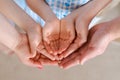 Large family holds palms their hands together, concept happiness in the family Royalty Free Stock Photo